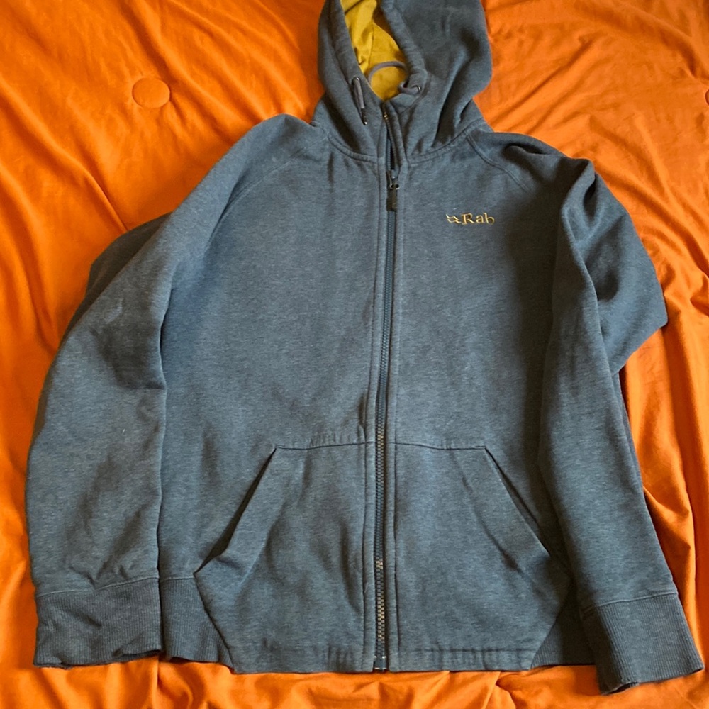 Mens Small RAB zip up hoodie blue with gold hood lining
